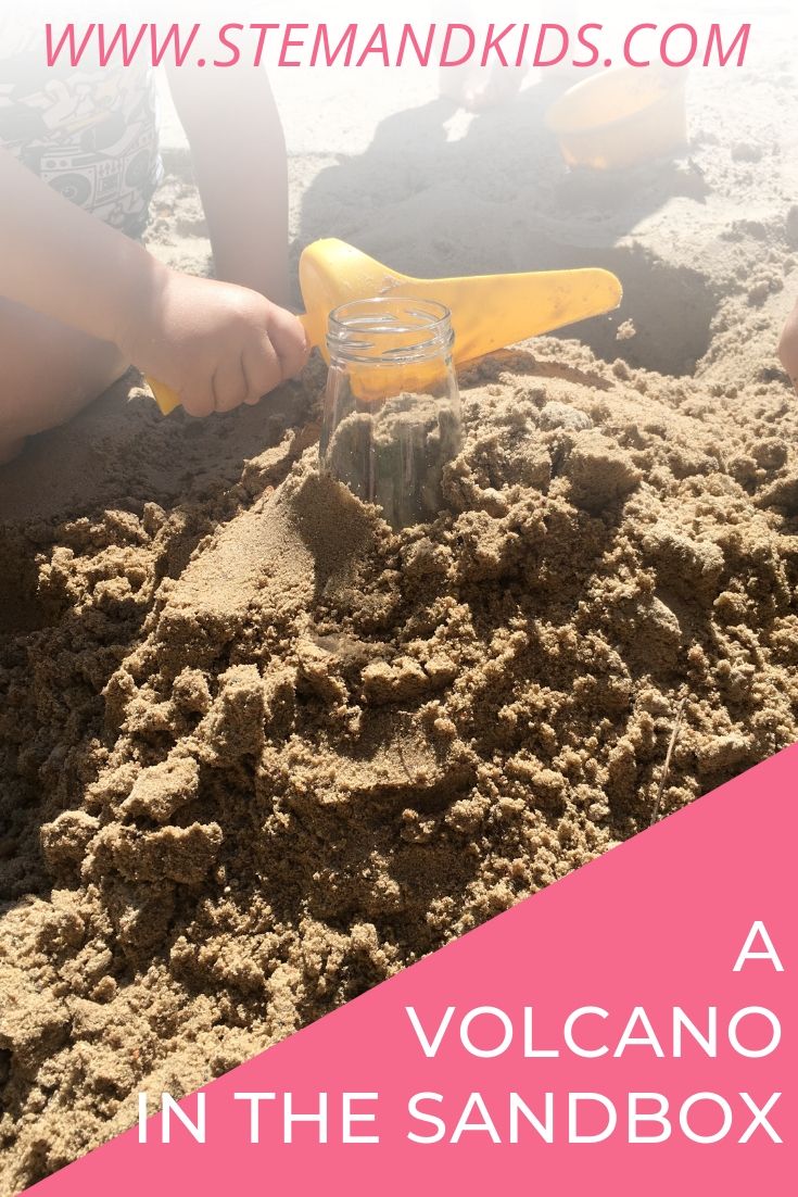 bottle covered in sand